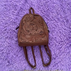 Brown backpack style bag.